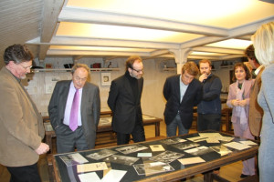 Michel Rocard (second from left), former prime minister of France and the Polare Embassador to the President examine the exhibit.